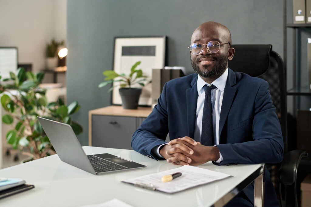 Manager Sitting At His Workplace In Office - ADF PRO